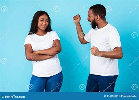 Black Couple Arguing Man Screaming At Annoyed Woman Stock Image