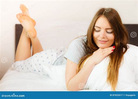cheerful girl rolling in bed stock image image of dreaming dream 87022617
