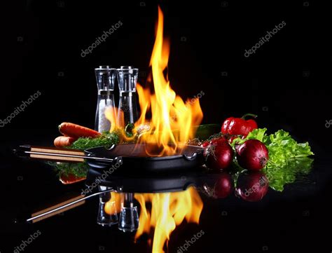 Frying Pan With Burning Fire Inside — Stock Photo © Yekophotostudio