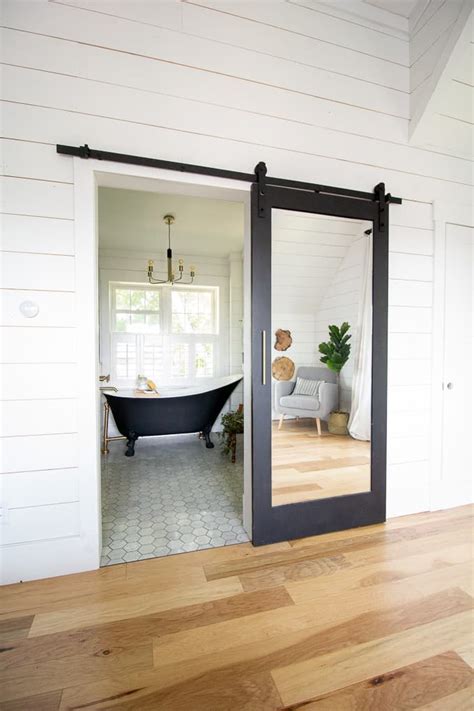 Bedroom bathroom nickel modern privacy door levers the. Modern Black and White Bathroom with Brass Accents ...