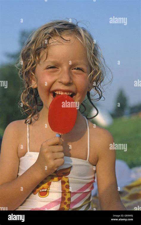 Girl Licking Popsicle Hi Res Stock Photography And Images Alamy