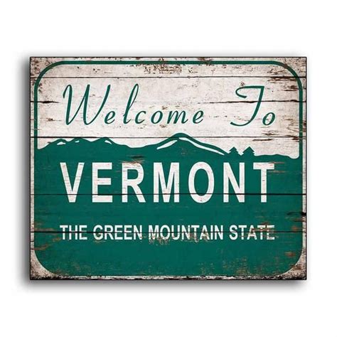 A Green And White Sign That Says Vermont The Green Mountain State Is
