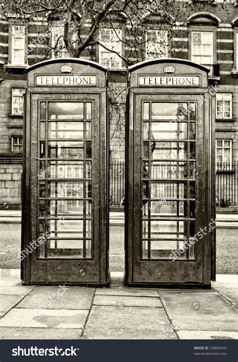 Pair Of Typical London Phone Booths In Black And White Stock Photo