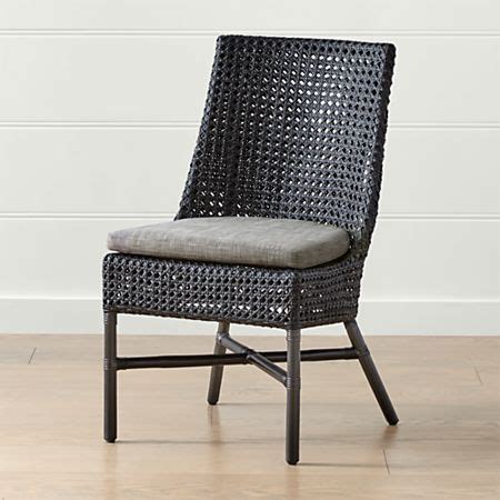 Warm mindi wood frames a strong silhouette while indonesian rattan curves to shape the back and seat. Maluku Black Rattan Dining Side Chair and Cushion | Side ...