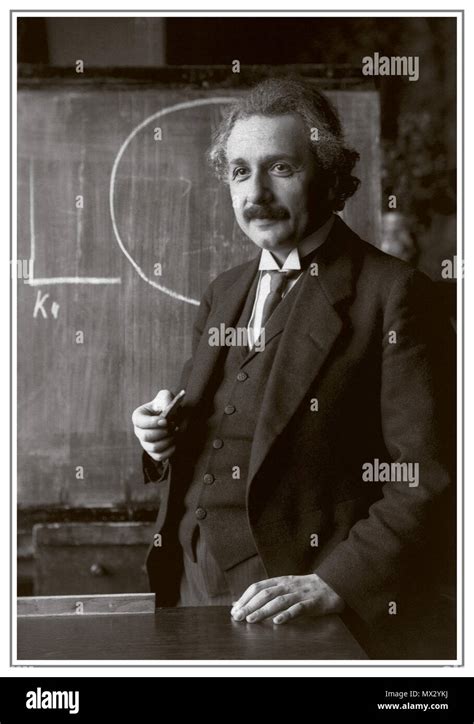Albert Einstein Holding Nobel Prize