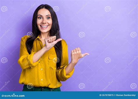 Portrait Of Pretty Cheerful Person Indicate Thumb Fingers Empty Space