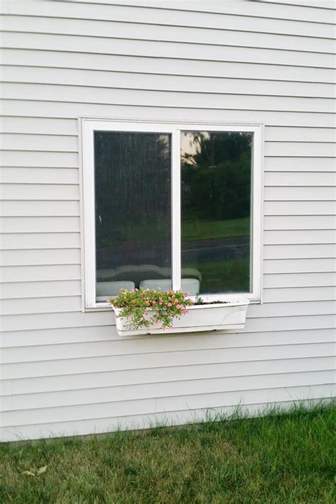 Window planters provide a spot to plant flowers in the smallest available space. IHeart Organizing: Do It Yourself: Window Planter Box