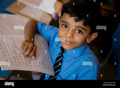 School Boy With His Notebook Stock Photo Alamy