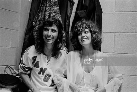 Alice cooper talks guillotines, john lennon and chickens. Alice cooper with young lady; circa 1970; New York.