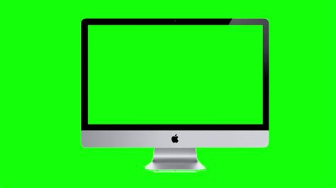 Young man from behind sitting at a table with a computer with a green screen, and also a green chroma screen in the background. MAC Green Screen Footage - YouTube