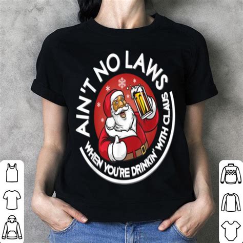 pretty aint no laws when you re drinking with claus christmas santa shirt hoodie sweater