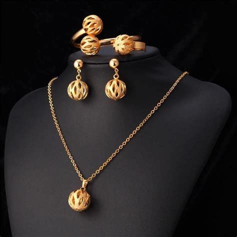 Because 14k gold has a higher alloy content than 18k gold, it can. Elegant Ball 18K Gold/Platinum Plated Necklace/Earrings/Bracelet/Ring Jewelry Set | Simple ...