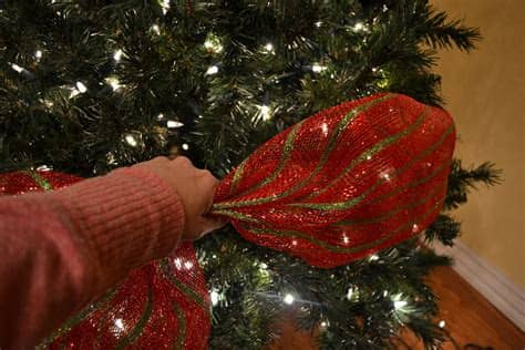 You can create a garland made from deco mesh, or the number of pieces you need will vary depending on the size of your tree and how much deco mesh you would like. Kristen's Creations: Decorating A Christmas Tree With Mesh ...
