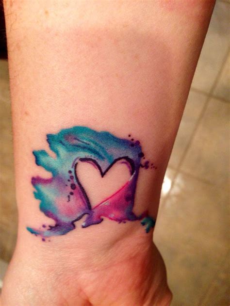 Another embellishment for her fashionable ear. 55 Amazing Heart Tattoos to Melt Your Heart