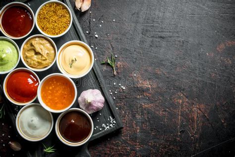 Variety Of Sauces In White Bowls Stock Photo Image Of Mustard