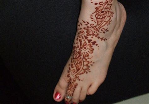 12 Brown Color Tattoo On Foot