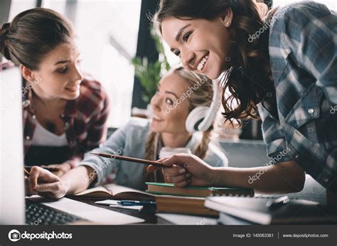 Students Studying Together — Stock Photo © Arturverkhovetskiy 145063361