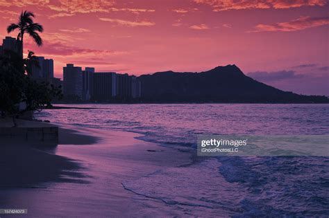 Dawn At Waikiki Beach In Hawaii With Diamond Head In The Background