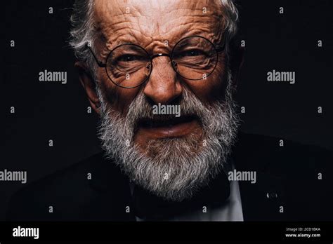 Close Up Portrait Of Old Man With Angry Evil Horror Expression On Face