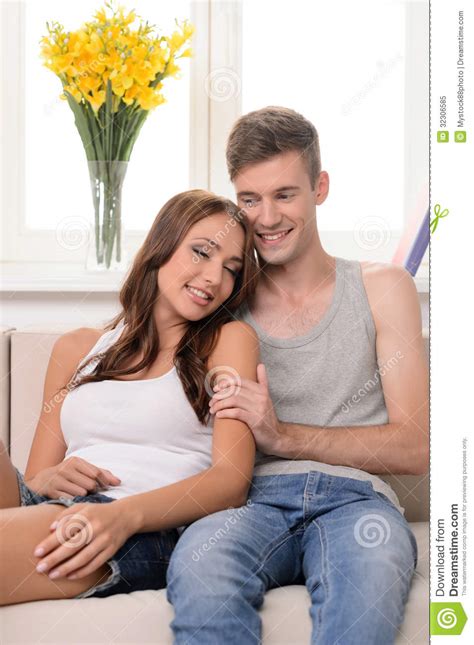 So Good To Be Together Beautiful Young Couple Sitting Close To Stock