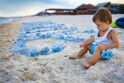 152 Child Sitting Beach Sand Little Boy Near Sea Photos Free