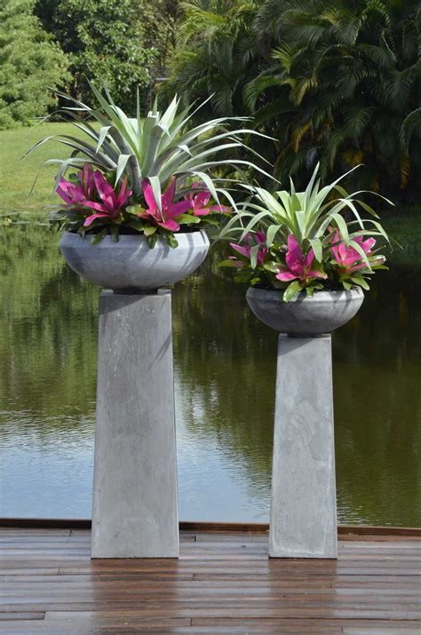 Fiber Stone Contemporary Shaped Pedestals With Low Bowl Planters On Top