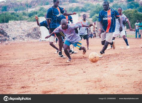 Black African Children Playing Soccer In A Rural Area Stock Editorial