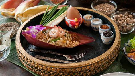 hands on thai cooking class and tour bangkok s biggest fresh market morning takemetour