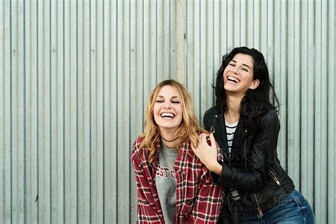 Laughing Girlfriends By Stocksy Contributor Guille Faingold Stocksy