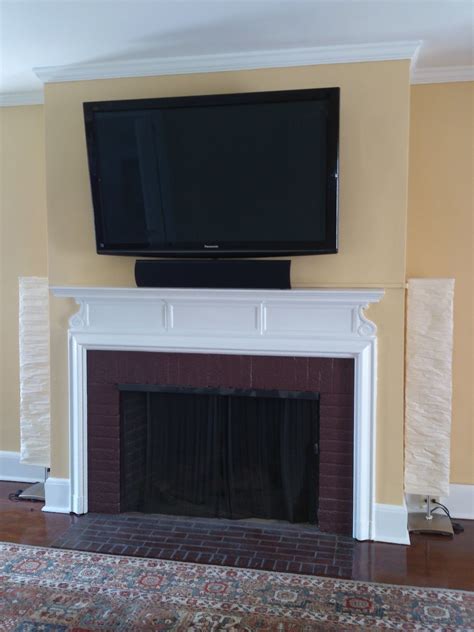 How Do You Mount A Tv Above A Fireplace On A Brick Wall Without Showing