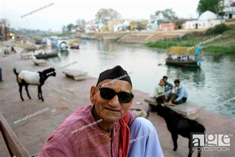 Old Man Sitting At Ramghat Chitrakoot Uttar Pradesh India Stock