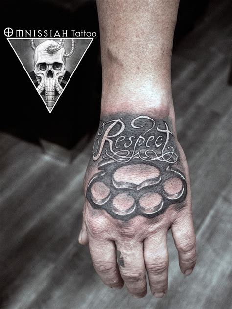 Brass Knuckles Tattoo On Hand