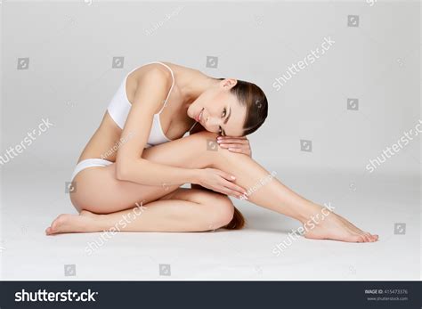Slim Tanned Womans Body Over Gray Stock Photo Shutterstock