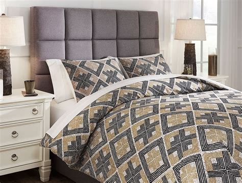 Check out our blue brown comforter selection for the very best in unique or custom, handmade pieces from our shops. Scylla Brown and Black Comforter Set by Signature Design ...