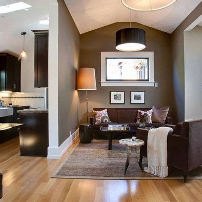Prefer light colored or dark brown colored furniture. Dark Taupe Accent Wall Design | Brown living room, Living ...