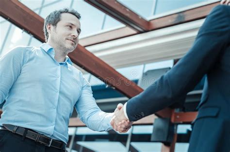 Concentrated Male Person Shaking Hands With Partner Stock Image Image