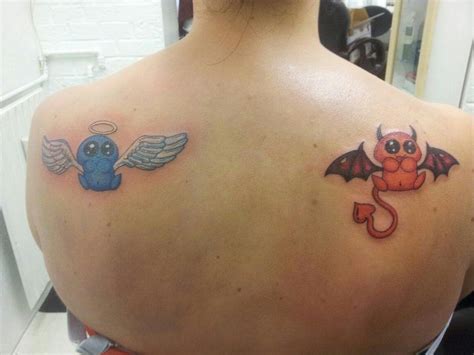 Angel Vs Devil Shoulder Tattoo