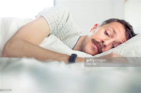 Man With Insomnia High Res Stock Photo Getty Images