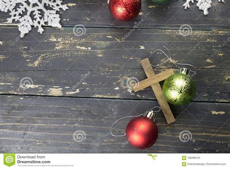 Christmas Holiday Ornaments And Christian Cross On A Dark Wood B Stock