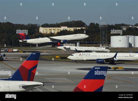 Delta Airlines Airplane Taking Off And Other Airport Traffic At The