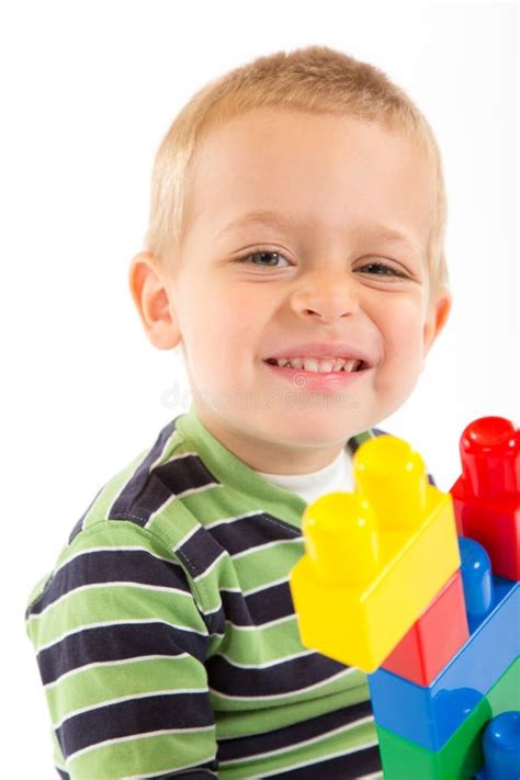 Little Cute Boy Playing With Building Blocks Isolated On White Stock