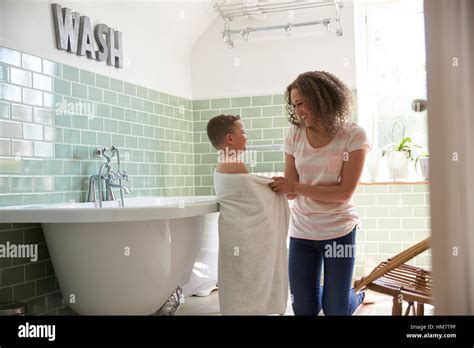 Mother Drying Son With Towel After Bath Stock Photo Alamy