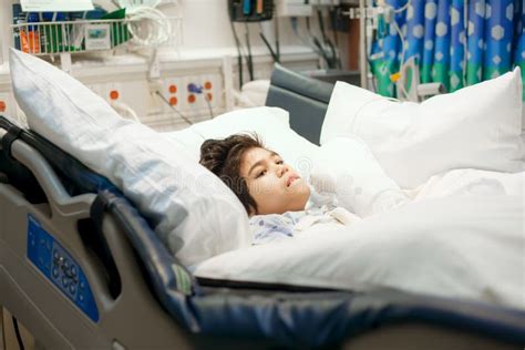 Disabled Little Boy Lying Sick In Hospital Bed Stock Image Image Of