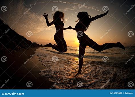 Girls Dancing In Sunset On Sea Stock Image Image Of Beacon Adult