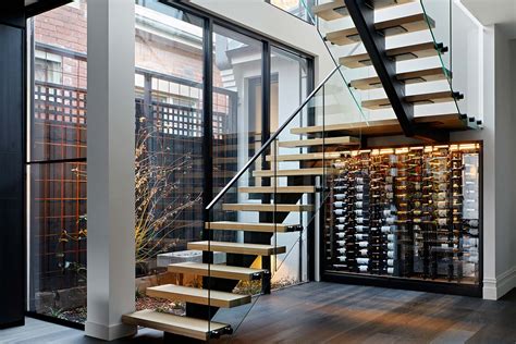 Occupying a narrow lot in Kew, Australia, the Molesworth Street House