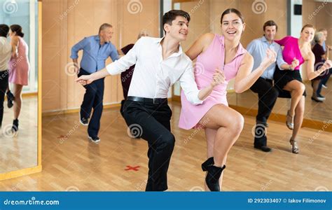 Cheerful Young Guy And Girl Practicing Ballroom Dances In Ballroom Stock Image Image Of Style