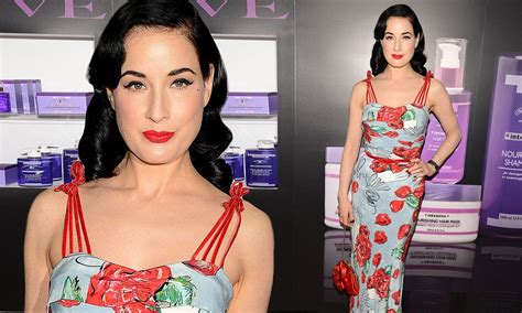 dita von teese shows off her perfect hourglass figure in fitted floral frock daily mail online