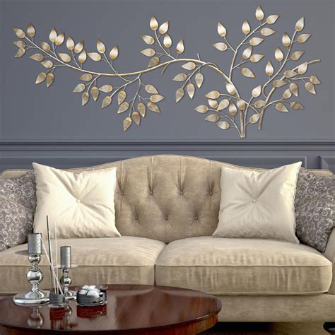 I made decorative home decor accent pieces using regular items. Stratton Home Decor Brushed Gold Flowing Leaves Wall Decor ...