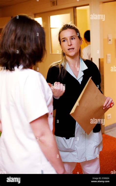 Psychiatric Nurse Talking With A Nurse Emergency Department Limoges