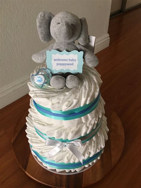 The middle daughter is a wall flower who yearns for a gangster. Easy simple DIY diaper cake boy first attempt | Diy diaper ...